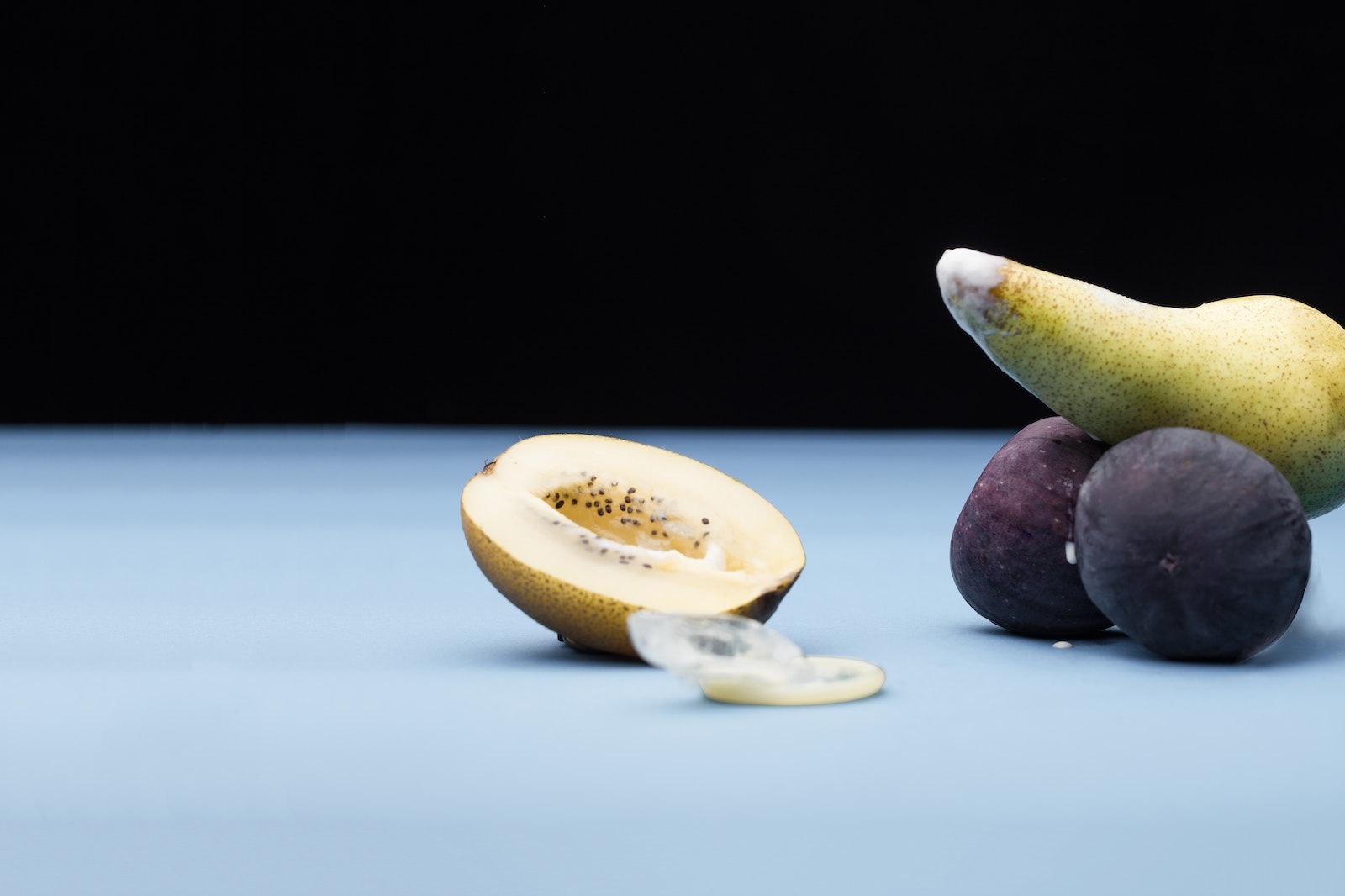 Sliced Lemon and Green Fruit